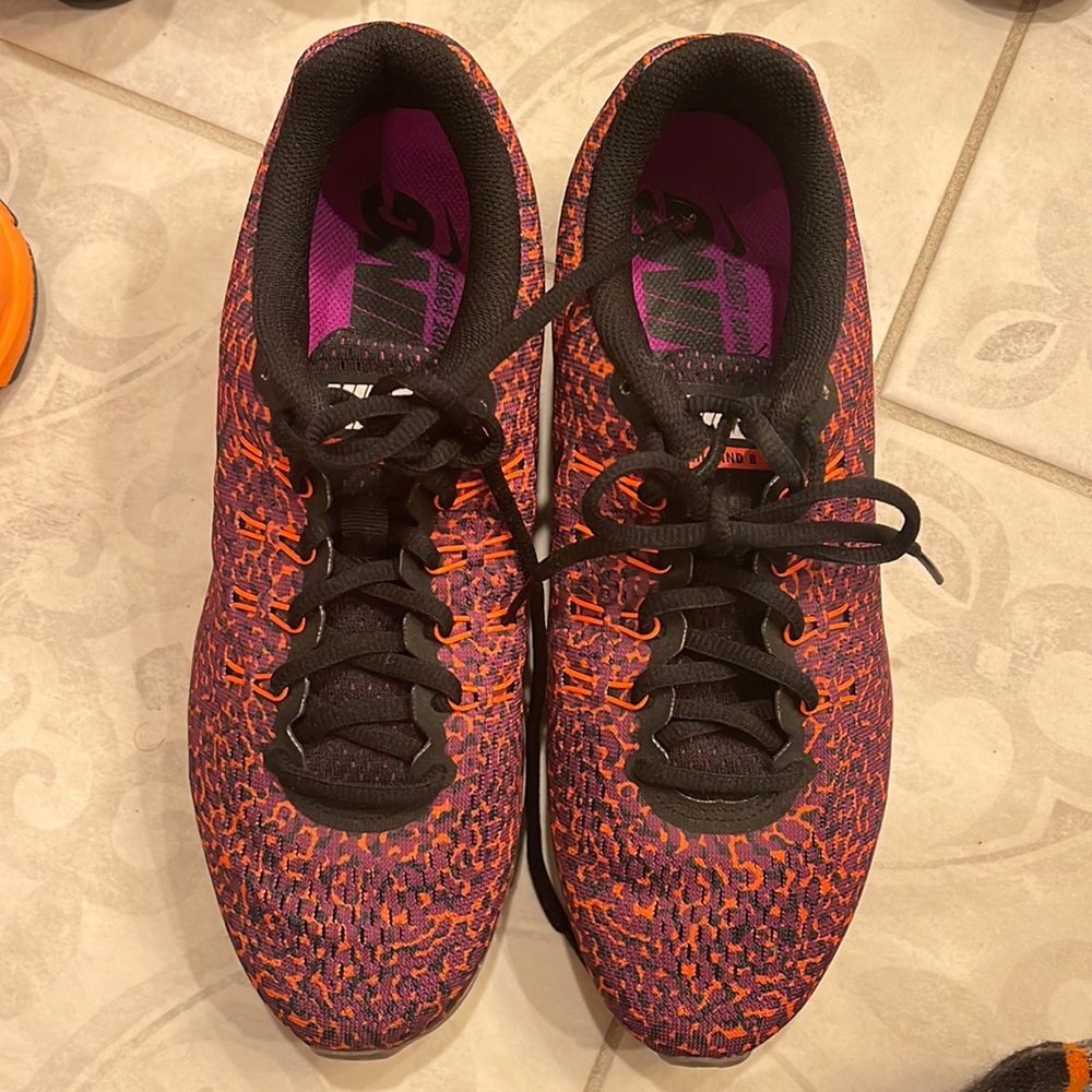 Nikes multi colored orange black and magenta. Black trim and string